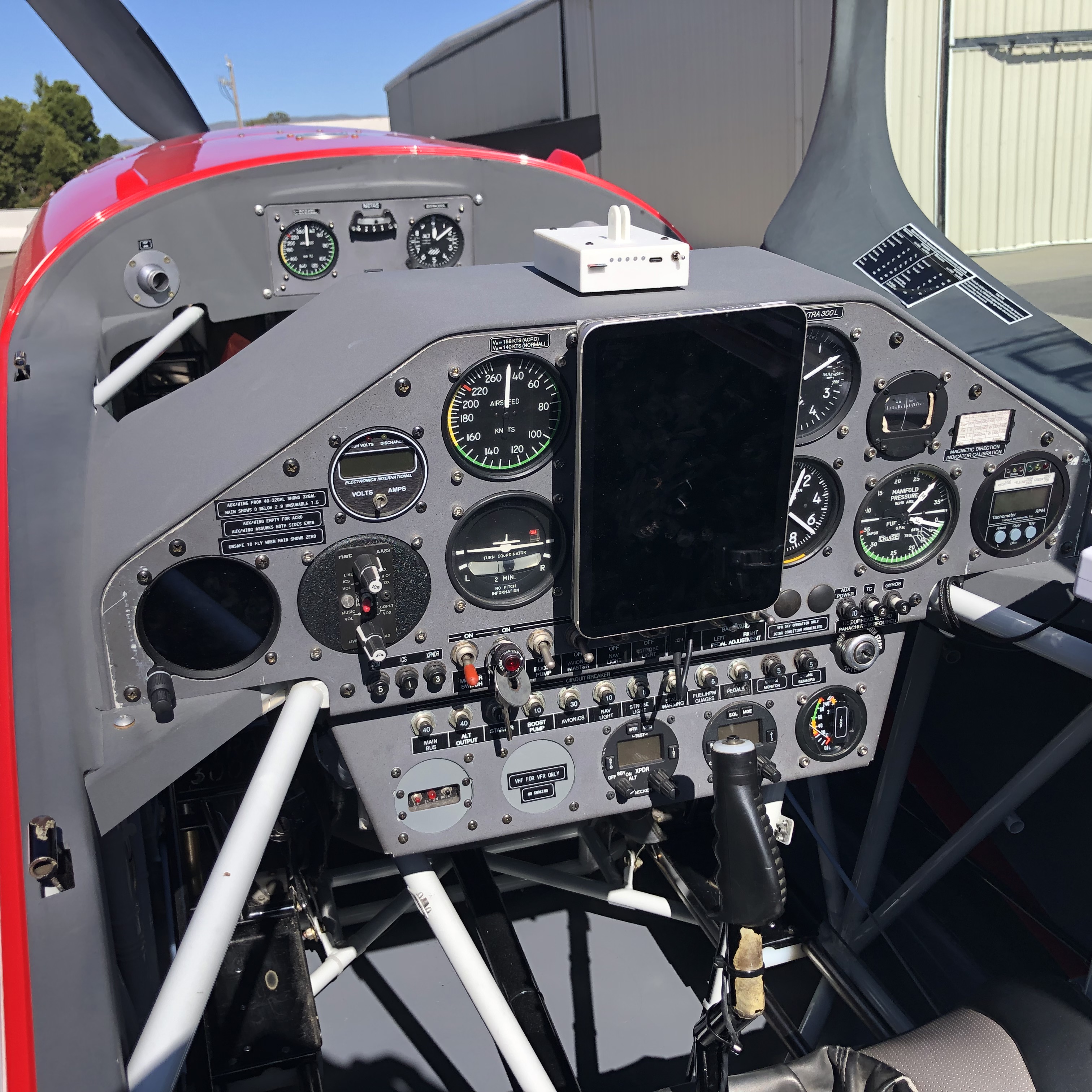 Previous-generation OnFlight Hub positioned above an aircraft instrument panel